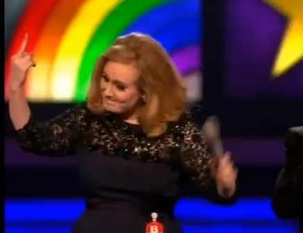 Adele-flips-bird-after-acceptance-speech-cut-off-Video